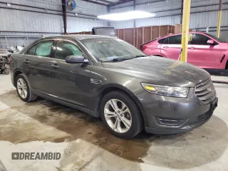 2017 Ford Taurus SEL with VIN 1FAHP2E82HG124014, listed as a Copart auction lot 47630015 with 136,099 mi miles and Salvage Title. Bid and sale history available at DreamBid. Image 4.