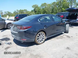 2021 Mazda 3 Select с VIN JM1BPABLXM1326518, выставлен на аукционе IAAI как лот 42130502 с пробегом 82 893 миль миль и . История ставок и продаж доступна на DreamBid. Изображение 4.