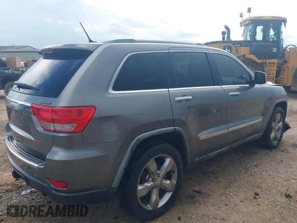 2011 Jeep Grand Cherokee Overland with VIN 1J4RS6GG0BC739582, listed as a IAAI auction lot 42537983 with 137,372 mi miles and . Bid and sale history available at DreamBid. Image 4.