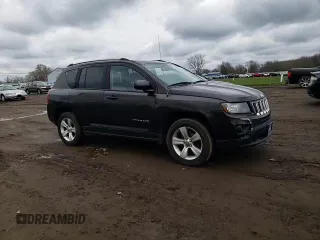 2014 Jeep Compass Sport with VIN 1C4NJDBB9ED670610, listed as a Copart auction lot 52691825 with 150,525 mi miles and Salvage Title. Bid and sale history available at carsss.com. Image 12.