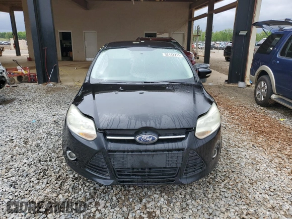 2013 Ford Focus SE z VIN 1FADP3F24DL216824, wystawiony jako Copart lot #52142715 z przebiegiem 149 611 mil mil oraz Szkoda całkowita • Salvage title. Historia ofert i sprzedaży dostępna na DreamBid. Obrazek 5.
