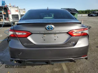 2019 Toyota Camry Hybrid LE z VIN 4T1B21HKXKU518106, wystawiony jako Copart lot #77074883 z przebiegiem 147 442 mil mil oraz Szkoda całkowita • Salvage title. Historia ofert i sprzedaży dostępna na DreamBid. Obrazek 6.