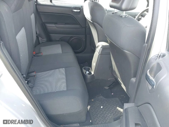 2009 Jeep Patriot Sport with VIN 1J4FT28B39D158917, listed as a IAAI auction lot 41727265 with 59,684 mi miles. Bid and sale history available at carsss.com. Image 8.
