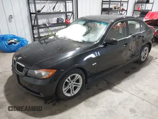 2008 BMW 3 Series 328xi with VIN WBAVC93538K043317, listed as a IAAI auction lot 41544348 with 127,823 mi miles. Bid and sale history available at carsss.com. Image 2.