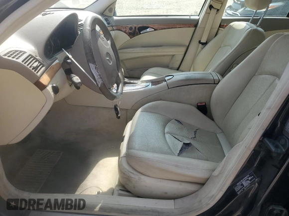 2003 Mercedes-Benz E-Class 3.2L with VIN WDBUF65JX3A313638, listed as a Copart auction lot 70869194 with 142,524 mi miles and Salvage Title. Bid and sale history available at carsss.com. Image 7.