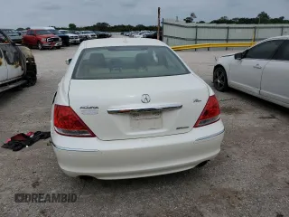 2005 Acura RL z VIN JH4KB16515C020791, wystawiony jako Copart lot #59802735 z przebiegiem Nie podano mil oraz Szkoda całkowita • Salvage title. Historia ofert i sprzedaży dostępna na DreamBid. Obrazek 6.