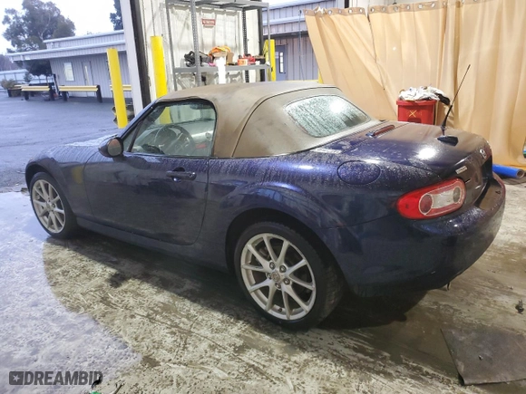 2009 Mazda MX-5 Miata Touring with VIN JM1NC25F090202680, listed as a Copart auction lot 84971324 with 56,166 mi miles and Salvage Title. Bid and sale history available at carsss.com. Image 2.