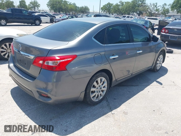 2018 Nissan Sentra S with VIN 3N1AB7AP1JY219661, listed as a IAAI auction lot 42001932 with 114,836 mi miles and . Bid and sale history available at DreamBid. Image 4.
