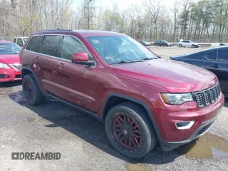 2017 Jeep Grand Cherokee Laredo with VIN 1C4RJEAG4HC965368, listed as a IAAI auction lot 42034698 with 110,152 mi miles. Bid and sale history available at carsss.com. Image 1.