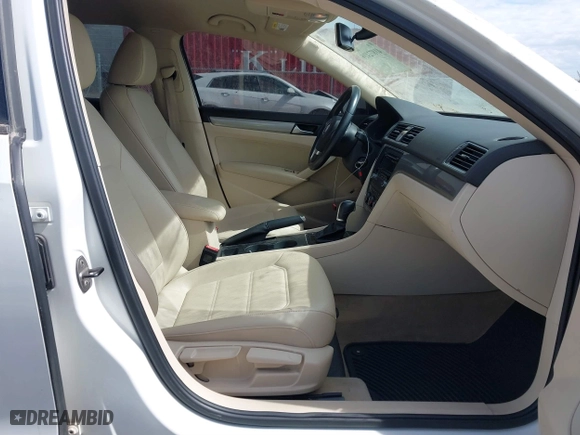2014 Volkswagen Passat Wolfsburg Ed with VIN 1VWAT7A32EC099677, listed as a IAAI auction lot 41872416 with 182,392 mi miles. Bid and sale history available at carsss.com. Image 5.