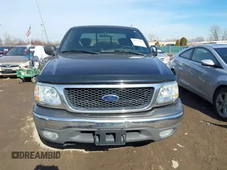 2003 Ford F-150 XL with VIN 1FTRX17W53NB00671, listed as a IAAI auction lot 41576739 with 194,066 mi miles. Bid and sale history available at carsss.com. Image 12.