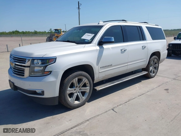 2020 Chevrolet Suburban Premier with VIN 1GNSCJKCXLR263570, listed as a IAAI auction lot 41980013 with 1 mi miles. Bid and sale history available at carsss.com. Image 2.