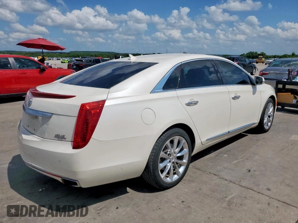 2013 Cadillac XTS Luxury with VIN 2G61P5S30D9149947, listed as a Copart auction lot 64482355 with 137,760 mi miles and Salvage title. Bid and sale history available at DreamBid. Image 3.