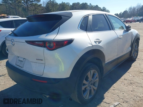 2021 Mazda CX-30 Select with VIN 3MVDMABL3MM239692, listed as a IAAI auction lot 41354738 with 48,928 mi miles and . Bid and sale history available at DreamBid. Image 4.