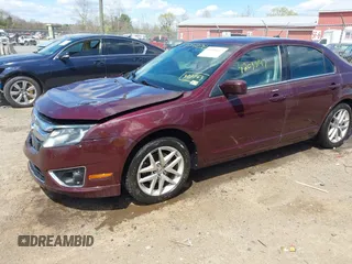 2012 Ford Fusion SEL with VIN 3FAHP0JG9CR302763, listed as a IAAI auction lot 42038147 with 154,645 mi miles and . Bid and sale history available at carsss.com. Image 2.