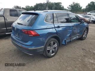 2020 Volkswagen Tiguan SE z VIN 3VV3B7AXXLM124257, wystawiony jako Copart lot #53740795 z przebiegiem 63 455 mil mil oraz Szkoda całkowita • Salvage title. Historia ofert i sprzedaży dostępna na DreamBid. Obrazek 3.