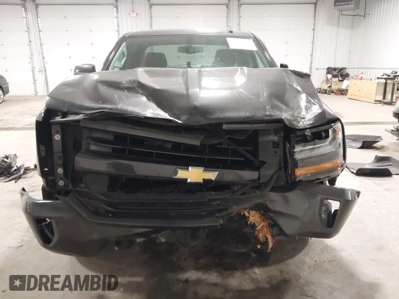 2016 Chevrolet Silverado 1500 LT with VIN 1GCVKREC0GZ303387, listed as a IAAI auction lot 41978237 with 123,692 mi miles and . Bid and sale history available at DreamBid. Image 6.