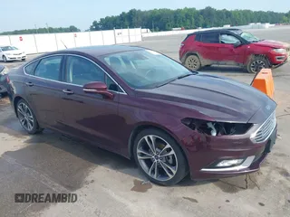 2017 Ford Fusion Titanium with VIN 3FA6P0K94HR271307, listed as a IAAI auction lot 42595411 with 100,344 mi miles and . Bid and sale history available at DreamBid. Image 1.