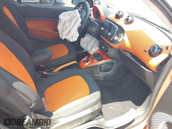 2016 Smart fortwo Passion with VIN WMEFJ5DA7GK079058, listed as a IAAI auction lot 42415044 with 42,279 mi miles and . Bid and sale history available at DreamBid. Image 5.