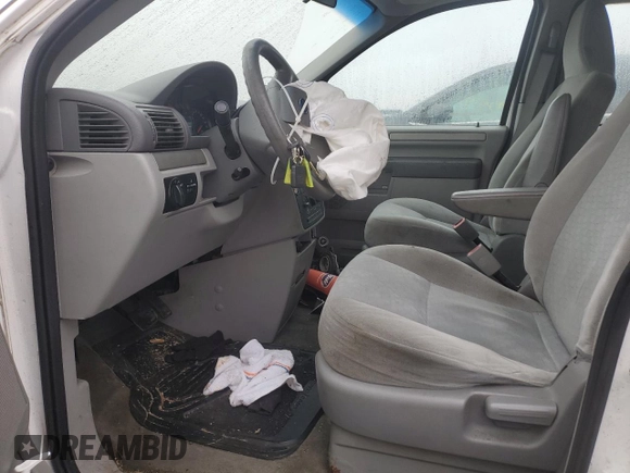 2007 Ford Freestar Cargo с VIN 2FTZA54627BA18587, выставлен на аукционе Copart как лот 84150524 с пробегом 162 761 миль миль и Списание • Salvage title. История ставок и продаж доступна на DreamBid. Изображение 7.