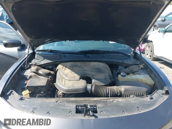 2018 Dodge Charger SXT Plus with VIN 2C3CDXHG9JH176400, listed as a IAAI auction lot 42128281 with 198,766 mi miles and . Bid and sale history available at carsss.com. Image 10.