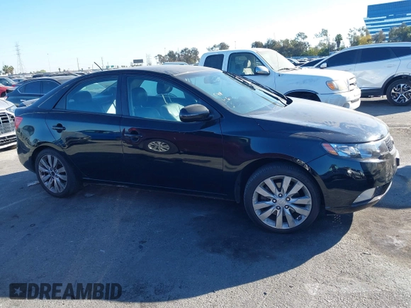 2012 Kia Forte SX with VIN KNAFW4A32C5623357, listed as a IAAI auction lot 41324098 with 217,354 mi miles. Bid and sale history available at carsss.com. Image 12.