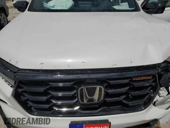 2024 Honda Pilot TrailSport z VIN 5FNYG1H60RB045659, wystawiony jako Copart lot #58575955 z przebiegiem 16 681 mil mil oraz Szkoda całkowita • Salvage title. Historia ofert i sprzedaży dostępna na DreamBid. Obrazek 12.