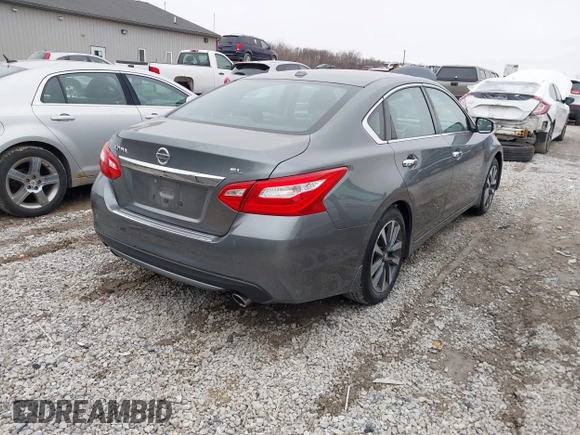 2016 Nissan Altima 2.5 S with VIN 1N4AL3AP6GC280451, listed as a IAAI auction lot 41738465 with 104,718 mi miles. Bid and sale history available at carsss.com. Image 4.