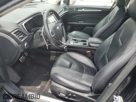 2017 Ford Fusion Titanium z VIN 3FA6P0K92HR192881, wystawiony jako Copart lot #61190515 z przebiegiem 109 834 mil mil oraz Szkoda całkowita • Salvage title. Historia ofert i sprzedaży dostępna na DreamBid. Obrazek 7.