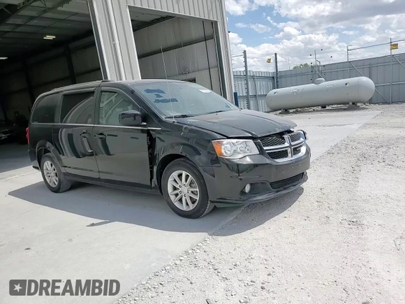 2018 Dodge Grand Caravan SXT z VIN 2C4RDGCG0JR267403, wystawiony jako Copart lot #57227545 z przebiegiem 117 549 mil mil oraz Szkoda całkowita • Salvage title. Historia ofert i sprzedaży dostępna na DreamBid. Obrazek 14.