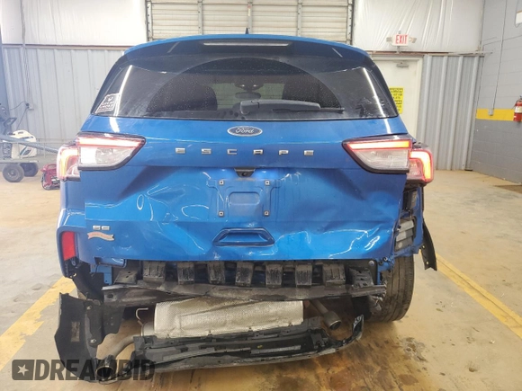 2021 Ford Escape SE with VIN 1FMCU0G61MUB00873, listed as a Copart auction lot 60718995 with 96,502 mi miles and Salvage title. Bid and sale history available at DreamBid. Image 6.