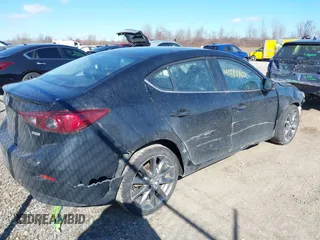 2018 Mazda 3 Touring with VIN 3MZBN1V39JM248441, listed as a IAAI auction lot 41888862 with 92,618 mi miles and . Bid and sale history available at DreamBid. Image 4.