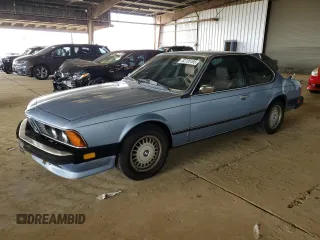 1985 BMW 6 Series 635CSi with VIN WBAEC8400F0611576, listed as a Copart auction lot 52735165 with 152,898 mi miles and Salvage Title. Bid and sale history available at carsss.com. Image 1.