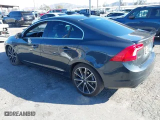 2016 Volvo S60 T5 Drive-E Premier with VIN YV126MFK2G2396190, listed as a IAAI auction lot 41682077 with 114,057 mi miles. Bid and sale history available at carsss.com. Image 3.