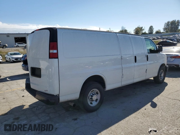 2017 Chevrolet Express Cargo Van with VIN 1GCWGBFG7H1135696, listed as a Copart auction lot 77438324 with 100,675 mi miles and Salvage Title. Bid and sale history available at carsss.com. Image 3.