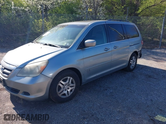 2007 Honda Odyssey EX-L with VIN 5FNRL38787B019019, listed as a IAAI auction lot 41974224 with 170,706 mi miles. Bid and sale history available at carsss.com. Image 2.