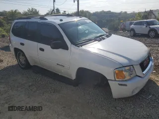2005 GMC Envoy SLT with VIN 1GKDT13S552329269, listed as a Copart auction lot 69209244 with 154,595 mi miles and Salvage Title. Bid and sale history available at carsss.com. Image 4.