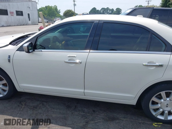 2012 Lincoln MKZ with VIN 3LNHL2GC1CR814101, listed as a IAAI auction lot 42594990 with 156,064 mi miles and . Bid and sale history available at DreamBid. Image 14.