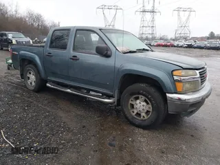 2006 GMC Canyon SLT with VIN 1GTDT136668295937, listed as a IAAI auction lot 41127322 with 214,995 mi miles. Bid and sale history available at carsss.com. Image 1.