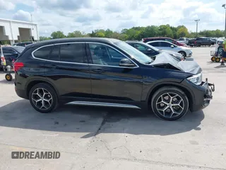 2019 BMW X1 sDrive28i with VIN WBXHU7C56K5L10962, listed as a IAAI auction lot 41904580 with 37,213 mi miles. Bid and sale history available at carsss.com. Image 14.