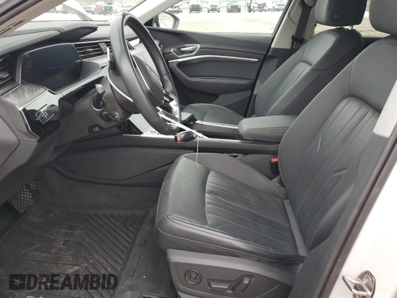 2021 Audi e-tron Premium Plus with VIN WA1LAAGE4MB003487, listed as a Copart auction lot 82790024 with 28,165 mi miles and Salvage title. Bid and sale history available at DreamBid. Image 7.