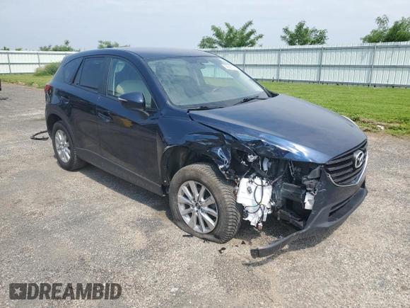 2016 Mazda CX-5 Touring с VIN JM3KE4CY8G0686101, выставлен на аукционе Copart как лот 60361215 с пробегом 126 804 миль миль и На запчасти • Non repairable. История ставок и продаж доступна на DreamBid. Изображение 4.