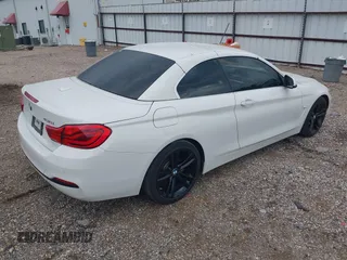 2018 BMW 4 Series 430i z VIN WBA4Z1C5XJEA31183, wystawiony jako IAAI lot #42133949 z przebiegiem 99 173 mil mil oraz . Historia ofert i sprzedaży dostępna na DreamBid. Obrazek 4.