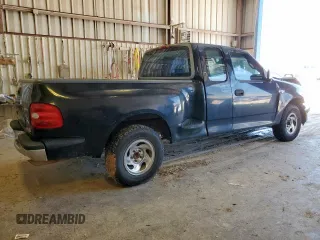 1998 Ford F-150 XL with VIN 1FTZX0725WKB83760, listed as a Copart auction lot 60988225 with 243,361 mi miles and Salvage title. Bid and sale history available at DreamBid. Image 3.