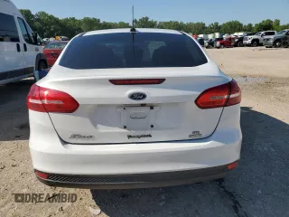 2017 Ford Focus SE with VIN 1FADP3FE8HL284169, listed as a Copart auction lot 61732695 with 70,443 mi miles and Salvage title. Bid and sale history available at DreamBid. Image 6.