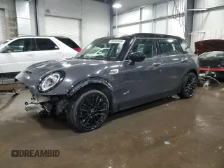 2021 MINI Clubman Cooper S with VIN WMWXJ1C05M2P49901, listed as a Copart auction lot 83023554 with 49,357 mi miles and Salvage Title. Bid and sale history available at carsss.com. Image 1.