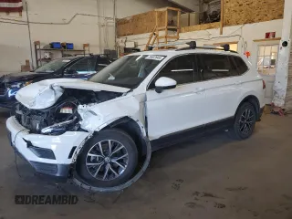 2020 Volkswagen Tiguan SE with VIN 3VV2B7AXXLM058031, listed as a Copart auction lot 76522644 with 34,361 mi miles and Salvage Title. Bid and sale history available at DreamBid. Image 1.