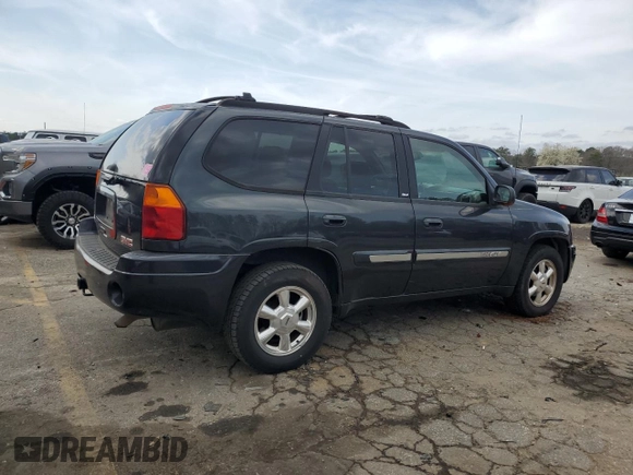 2003 GMC Envoy SLT z VIN 1GKDS13S332326838, wystawiony jako Copart lot #48888545 z przebiegiem 197 969 mil mil oraz Czysty tytuł • Clean title. Historia ofert i sprzedaży dostępna na DreamBid. Obrazek 3.