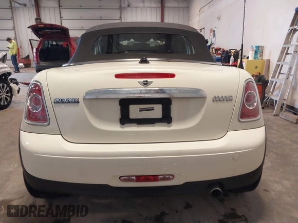 2013 MINI Roadster with VIN WMWSY1C52DT625564, listed as a IAAI auction lot 41442864 with 98,240 mi miles and . Bid and sale history available at DreamBid. Image 17.