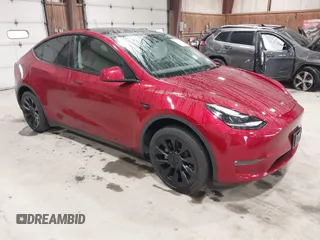 2024 Tesla Model Y Long Range with VIN 7SAYGAEE2RF986206, listed as a IAAI auction lot 42177852 with 14,399 mi miles and . Bid and sale history available at carsss.com. Image 1.